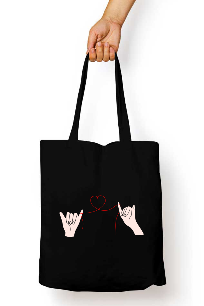 Unisex Tote Bag Zipper - two hands connected by a delicate red thread